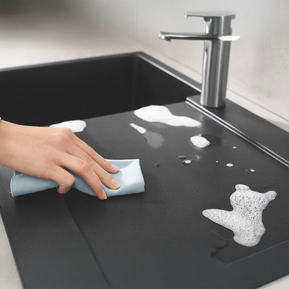 How do I clean a black sink?